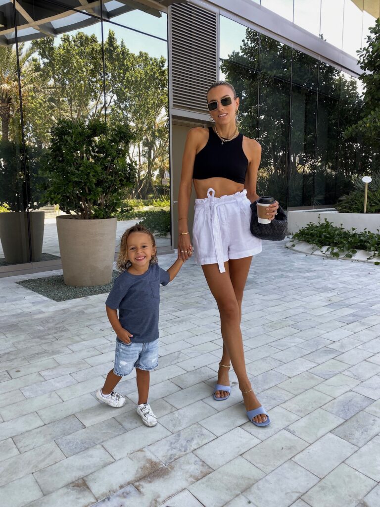 lagence shorts, white trouser shorts, geel top, black crop top, zara sandal, zara lavendar heel, celine sunglasses, unisex celine, kids golden goose, bottega veneta jodie bag, electric picks, stone and strand necklace, zara kids, miles baby