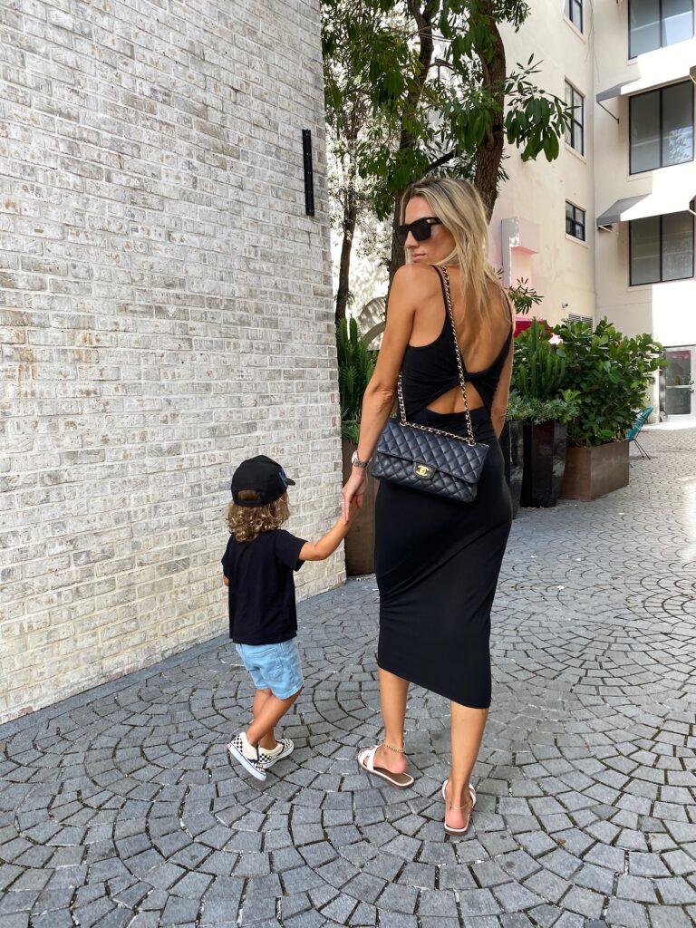 enza costa midi dress, enza costa twist back dress, black midi dress, hermes sandals, chanel bag, bottega veneta sunglasses, new bottega sunglasses, toddler vans